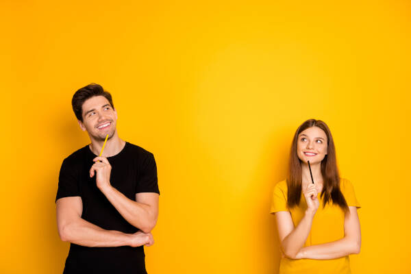 Man and woman thinking on either side of picture, holding pencil to chin to represent thoughtfulness
