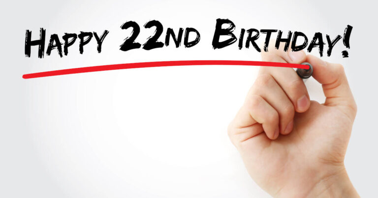 A hand writes 'HAPPY 22ND BIRTHDAY' and underlines it with a red marker.